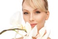 Beautiful woman with orchid flower Royalty Free Stock Photo