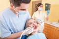 Beautiful woman patient in dentist office or cabinet Royalty Free Stock Photo