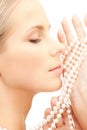 Beautiful woman with pearl beads Royalty Free Stock Photo