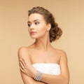 Beautiful woman with pearl earrings and bracelet Royalty Free Stock Photo