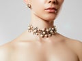 Beautiful woman with Pearl Necklace. Young beauty model with pearl pendant and earrings. Jewellery and accessories Royalty Free Stock Photo