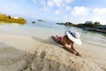 Beautiful woman with perfect body lying down on the beach Royalty Free Stock Photo