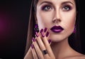 Beautiful woman with perfect make-up and manicure wearing jewellery Royalty Free Stock Photo