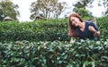 A beautiful woman picking tea leaf in a highland tea plantation Royalty Free Stock Photo