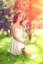 Beautiful woman on picnic on nature. Beautiful Young girl Outdoors. Enjoy Healthy Smiling Girl.