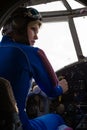 Beautiful woman pilot at wheel airplane Royalty Free Stock Photo