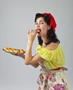 Beautiful woman with yummy biscuits. Royalty Free Stock Photo