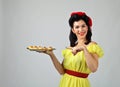 Beautiful woman with yummy biscuits. Royalty Free Stock Photo