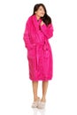 Beautiful woman in pink bathrobe. Royalty Free Stock Photo