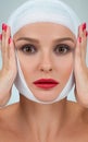 Beautiful woman after plastic surgery with bandaged face. Beauty, Fashion and Plastic Surgery concept Royalty Free Stock Photo