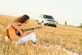 Beautiful woman playing gitar Royalty Free Stock Photo