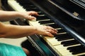 Beautiful woman playing piano,Close up of woman hands playing pi Royalty Free Stock Photo