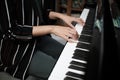 Beautiful woman playing piano, learn to play piano Royalty Free Stock Photo