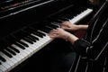 Beautiful woman playing piano, learn to play piano Royalty Free Stock Photo