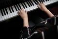 Beautiful woman playing piano, learn to play piano Royalty Free Stock Photo