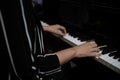 Beautiful woman playing piano, learn to play piano Royalty Free Stock Photo