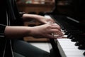 Beautiful woman playing piano, learn to play piano Royalty Free Stock Photo