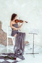 Beautiful woman playing the violin