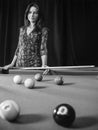 Beautiful woman at the pool table Royalty Free Stock Photo