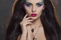 Beautiful woman portrait with bright colourful makeup