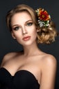 Beautiful woman portrait with flowers in hair. Royalty Free Stock Photo
