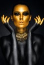 Beautiful woman portrait in gold and black colors Royalty Free Stock Photo