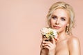 Beautiful Woman Portrait with Peony Flowers Bouquet, Smiling Fashion Models Smelling Flower Royalty Free Stock Photo
