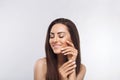 Beautiful woman portrait, skin care concept Portrait of female hands with french manicure nails touching her face Royalty Free Stock Photo