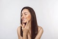 Beautiful woman portrait, skin care concept Portrait of female hands with french manicure nails touching her face. Spa. Royalty Free Stock Photo