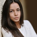 Beautiful woman portrait of teen girl outdoors. Closeup