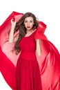 beautiful woman posing with red chiffon veil Royalty Free Stock Photo