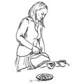 Beautiful woman pouring tea in cups, which stand on the table near plate with cookies