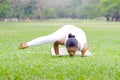 Beautiful woman practicing yoga in the park Royalty Free Stock Photo