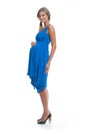 Beautiful Woman Pregnant model in blue dress on white isolated background posing. Clothes for pregnant women