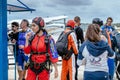 Beautiful woman prepares to skydive.