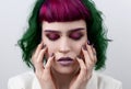 Beautiful woman with purple green professional colored hair Royalty Free Stock Photo