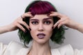 Beautiful woman with purple green professional colored hair Royalty Free Stock Photo