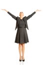 Beautiful woman raising arms high Royalty Free Stock Photo