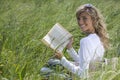 Beautiful Woman Reading Outdoors Royalty Free Stock Photo