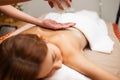 beautiful woman receiving massage oil in spa Royalty Free Stock Photo