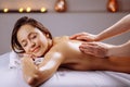 Spa body massage treatment. Woman having massage in spa salon Royalty Free Stock Photo