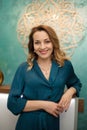 Beautiful woman at reception desk in yoga and wellness center