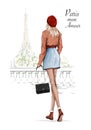 Beautiful woman in red beret. Fashion lady holding bag. Stylish girl walking near Eiffel Tower. Royalty Free Stock Photo