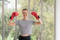 Beautiful woman with the red boxing gloves