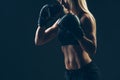 Beautiful woman with the red boxing gloves,black Royalty Free Stock Photo