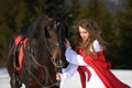 Beautiful woman with red cloak Royalty Free Stock Photo