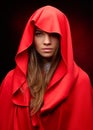 Beautiful woman with red cloak Royalty Free Stock Photo