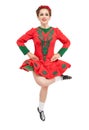 Beautiful woman in red dress for Irish dance jumping isolated Royalty Free Stock Photo