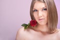 Beautiful woman with red rose Royalty Free Stock Photo