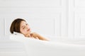 Beautiful woman relaxing in bathtub